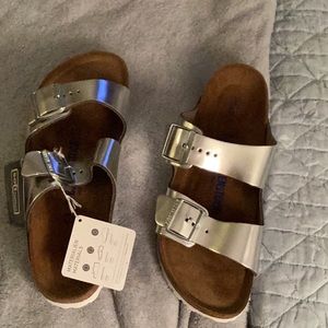 Birkenstock Arizona sandals. New. Silver